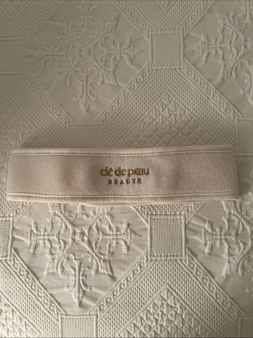 WHITE FINE TERRYCLOTH CLE DE PEAU  HEADBAND—BRAND NEW AND UNUSED